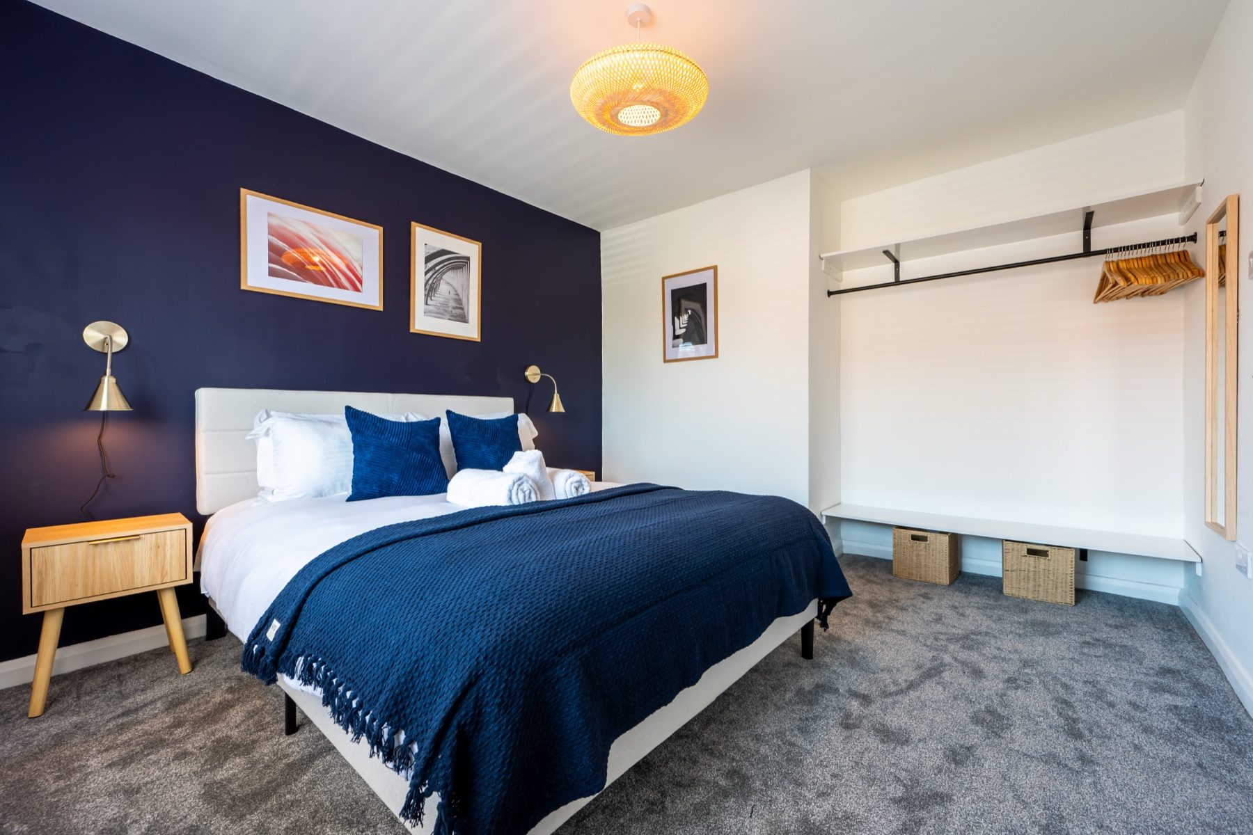 Lord Lodge king bedroom with blue feature wall