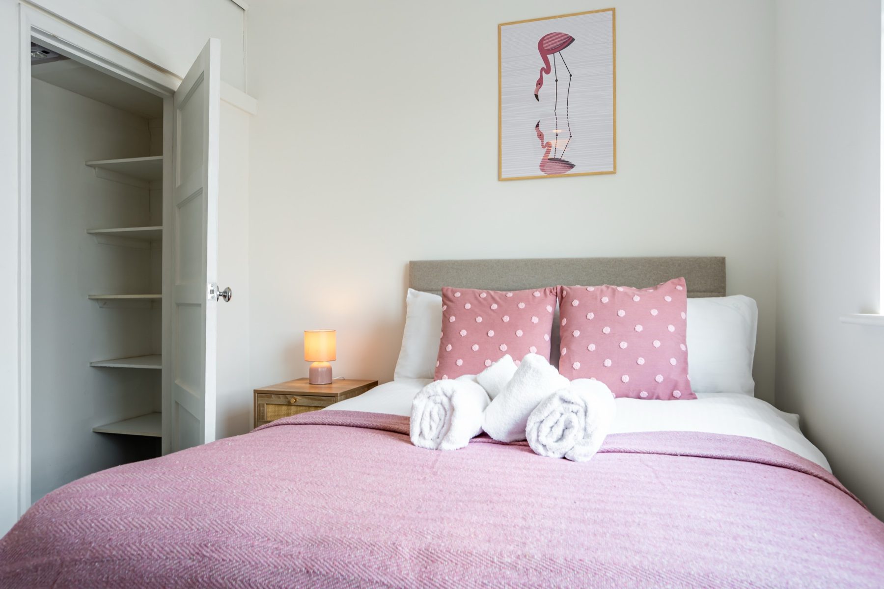 Lord Lodge double bedroom with pink bedding