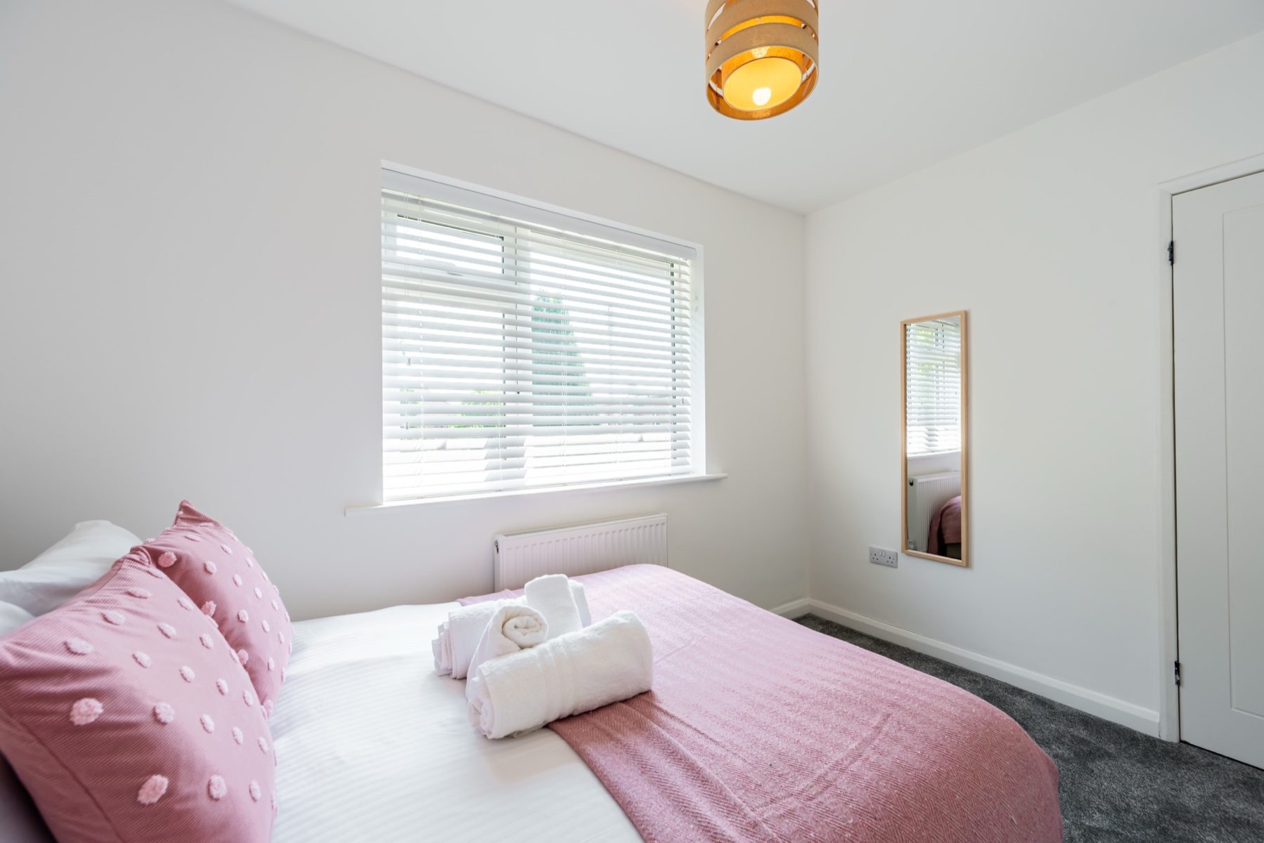 Lord Lodge double bedroom with window and mirror