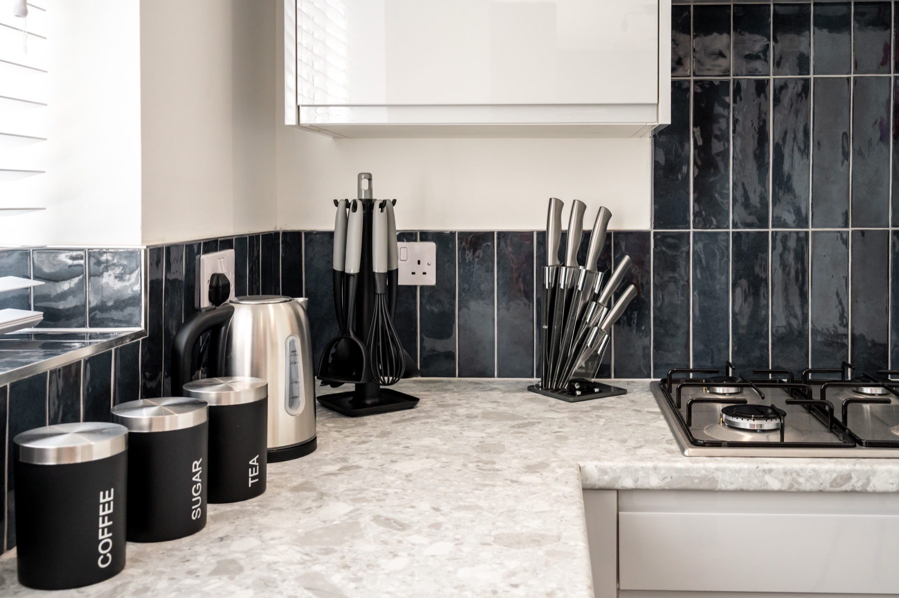Lord Lodge kitchen hob with utensils and kettle