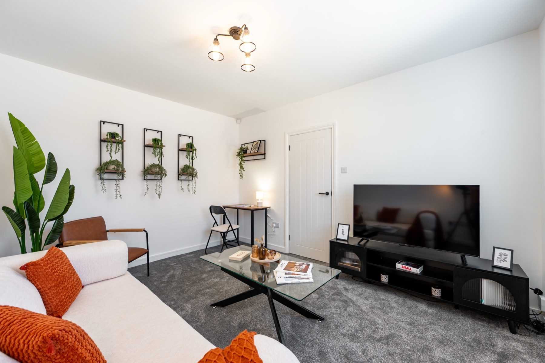 Lord Lodge lounge with smart TV and dedicated workspace