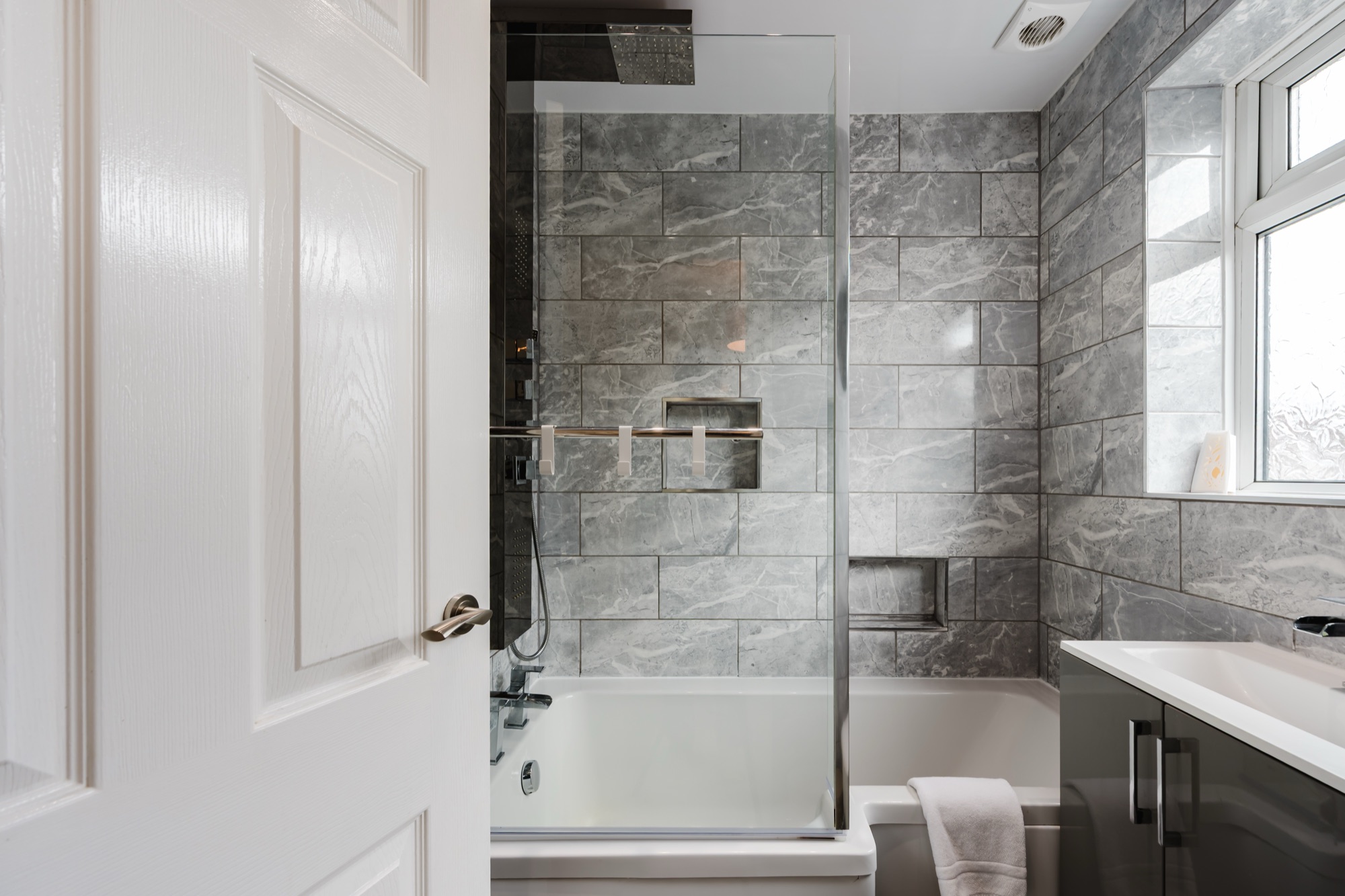Parkland Place bathroom with shower over bath